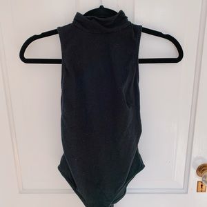Black turtleneck bodysuit